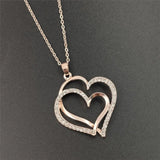 Interlocking Gold Hearts - Downtown Girl